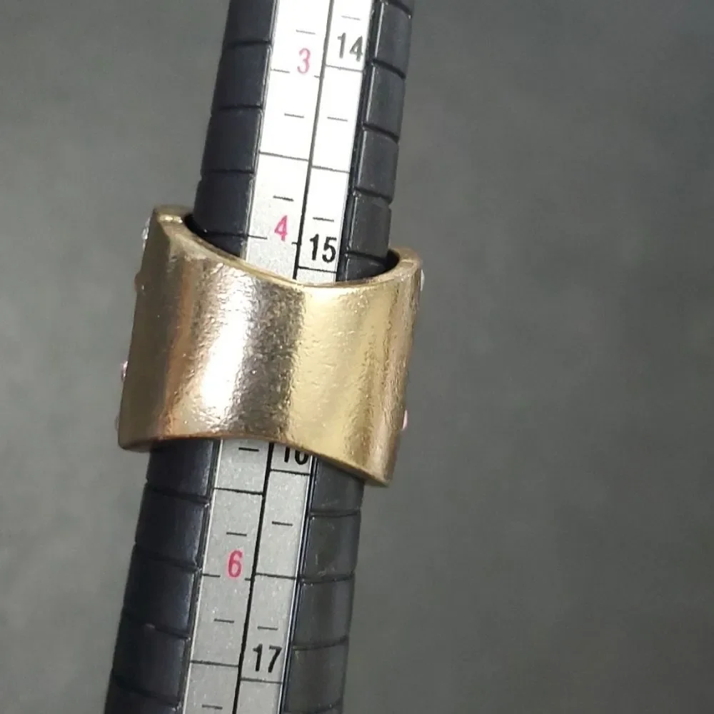 Gold tone wide rhinestone ring - Approx 5 pink chunky